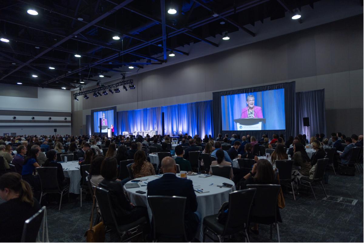 A wide shot of the audience during the official opening.